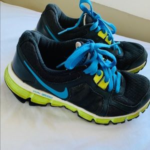 Neon And black Nike’s